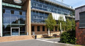 school with glass facade