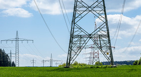 Power poles on a meadow