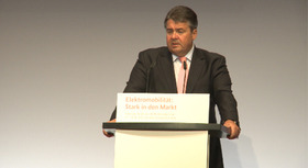 Federal Minister Sigmar Gabriel speaking at the National Conference on Electric Mobility in Berlin.