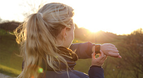 Woman checking her smartwatch.