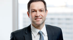 Portrait von Lars Quandel, Leiter der Geschäftssparte erneuerbare Energien bei der HSH Nordbank