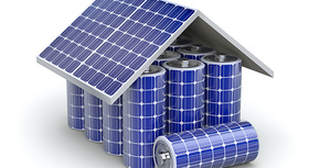 Illustration: Ein Haus zusammengesetzt aus Solarzellen und Batterien.